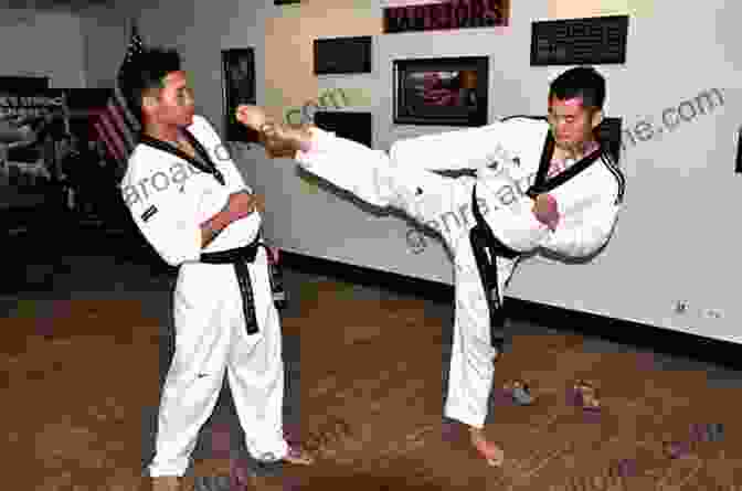 Image Of A Tae Kwon Do Practitioner Receiving A Black Belt Advancing In Tae Kwon Do