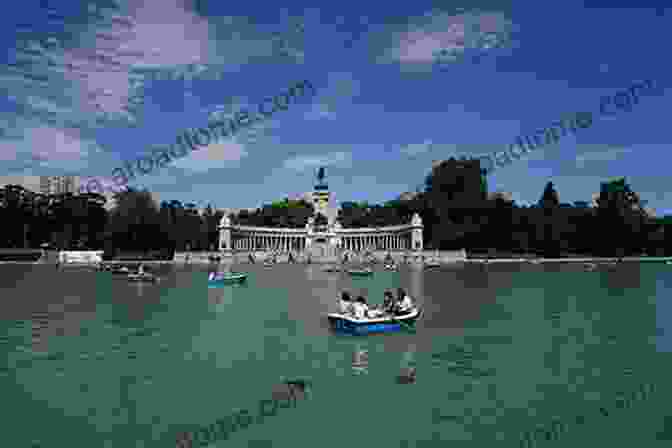 The Tranquil Lake And Rowboats In El Retiro Park, Madrid's Largest Green Space. Madrid Travel Guide 2024 : Top 20 Local Places You Can T Miss In Madrid